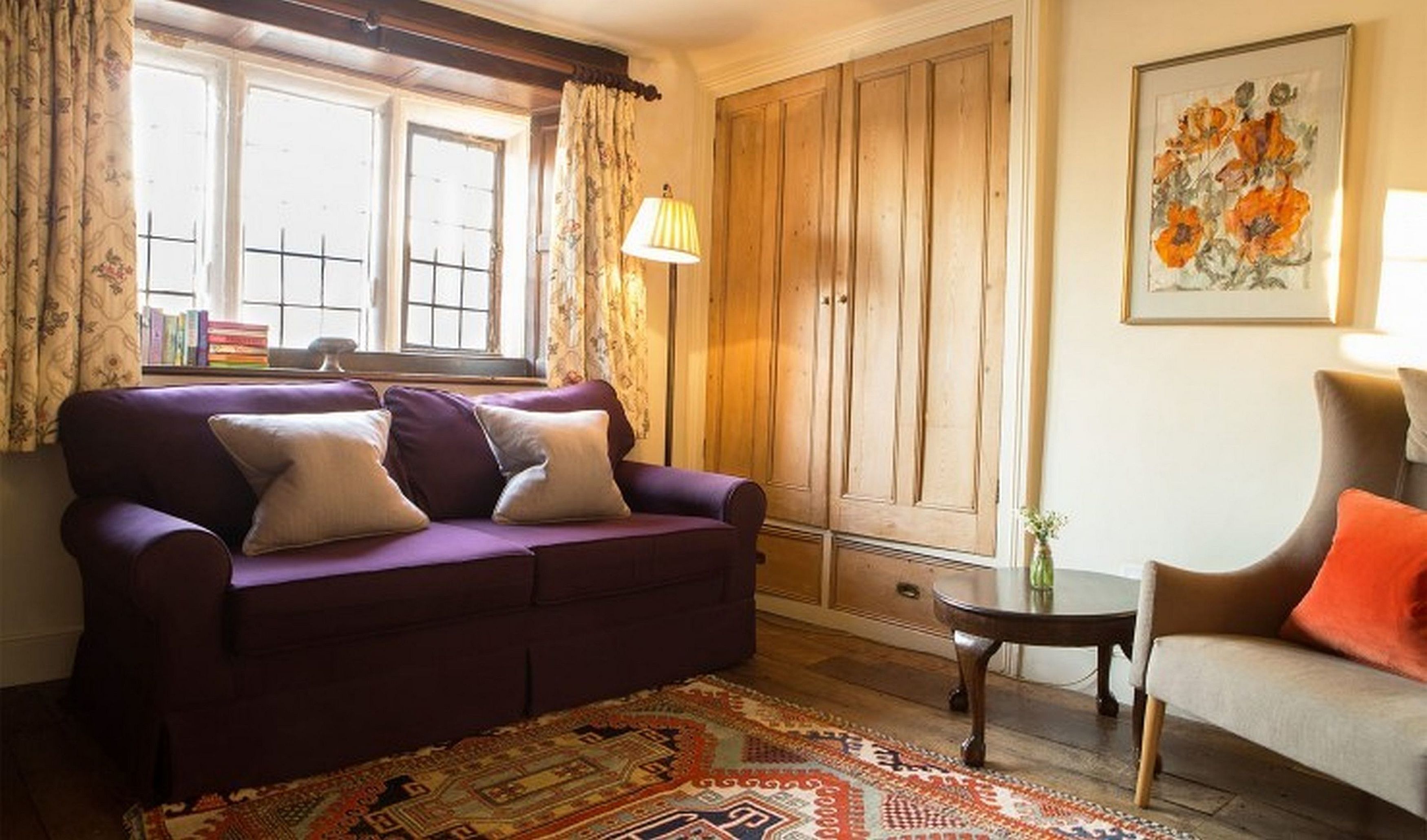 one bedroom john baskerville suite | living area | flat-screen tv