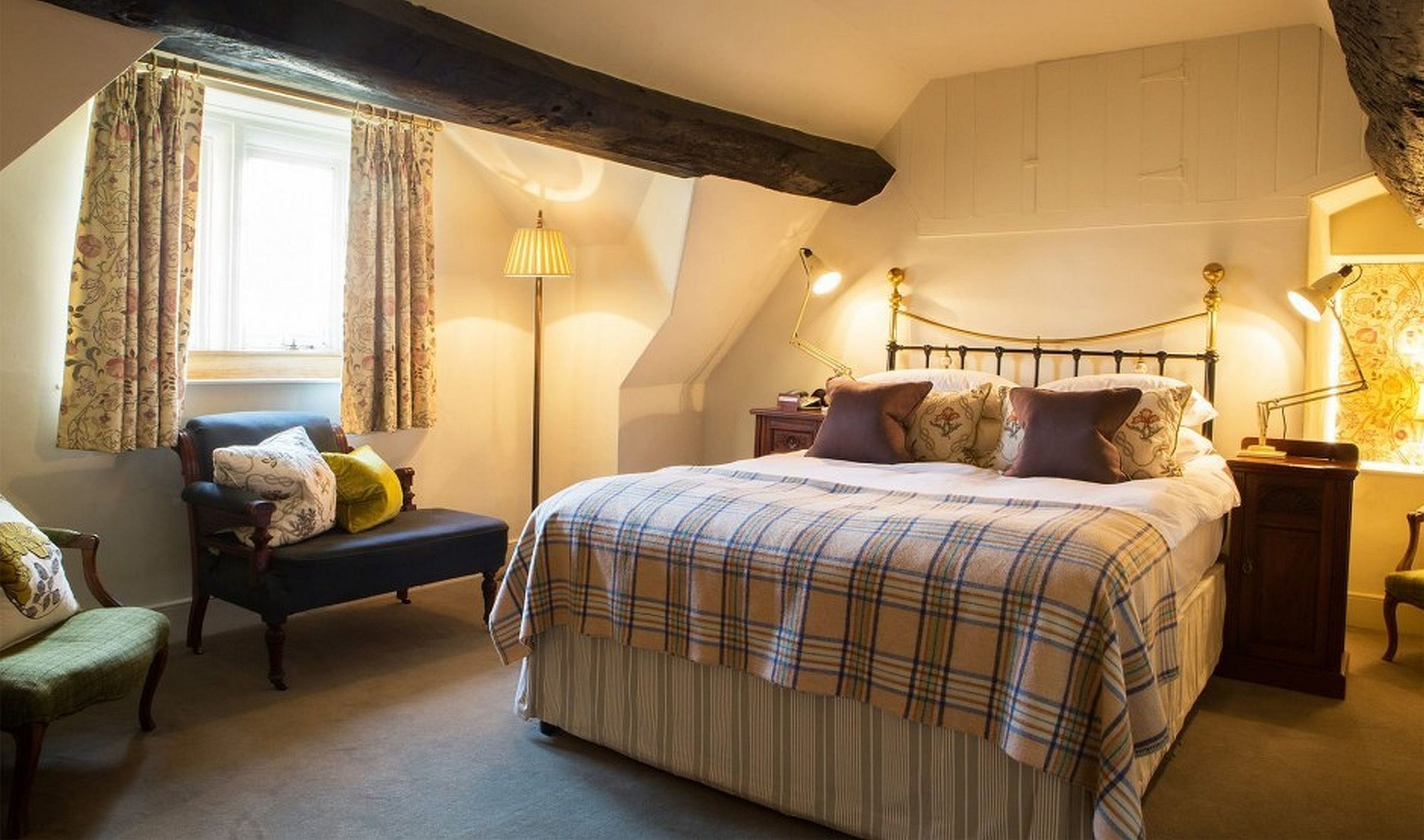 one bedroom john baskerville suite | premium bedding, desk, blackout curtains, iron/ironing board