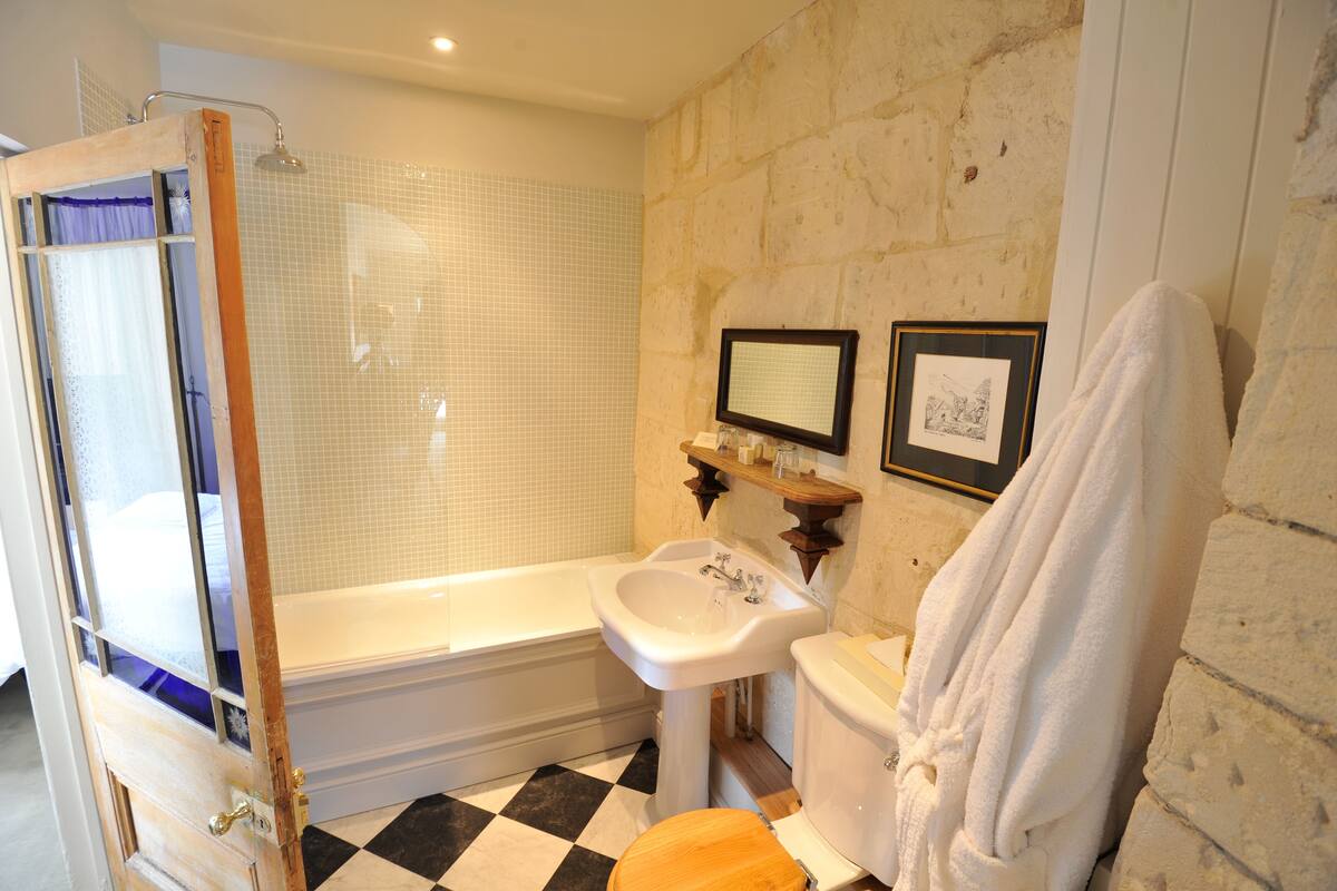 two bedroom suite | bathroom | combined shower/bathtub, hair dryer, towels