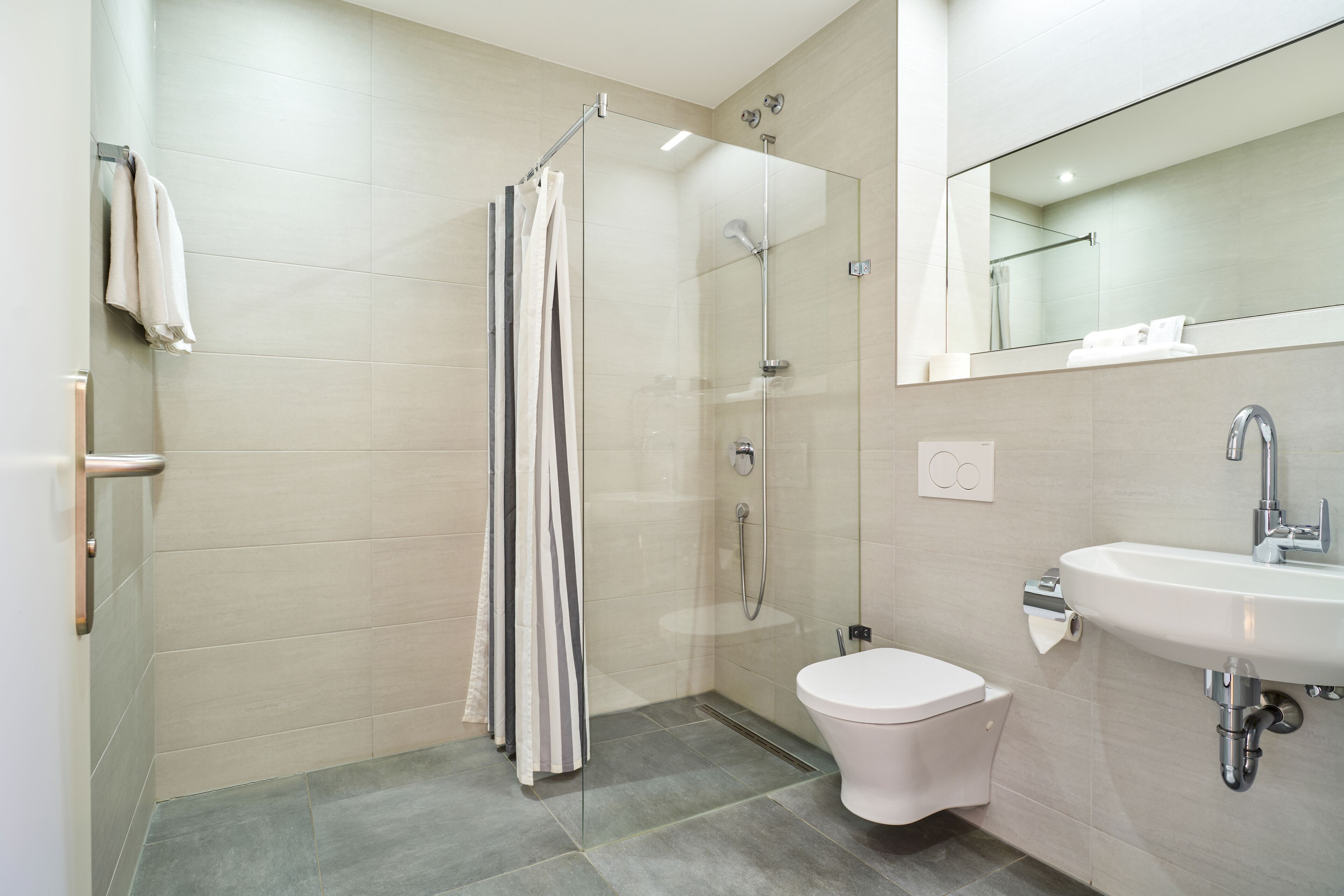 shower, free toiletries, hair dryer, towels