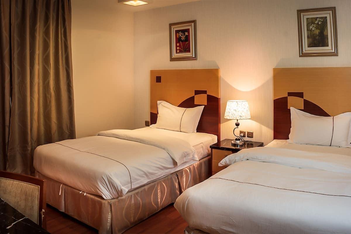 Superior Suite, 2 Bedrooms | 1 bedroom, in-room safe, desk, iron/ironing board