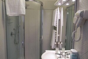 Shower, free toiletries, hair dryer, towels