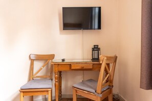 Desk, free WiFi, bed sheets