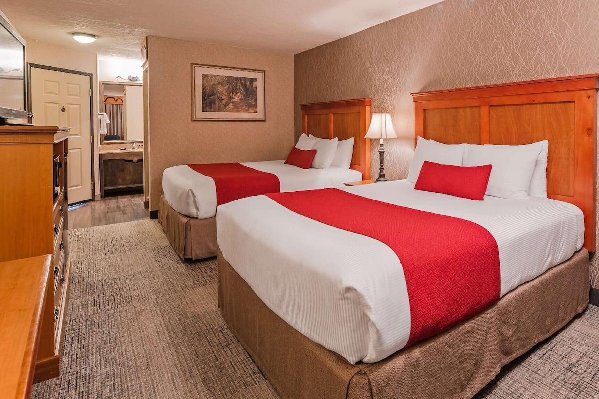 Standard Room, 2 Queen Beds, Balcony, River View | Desk, laptop workspace, blackout curtains, iron/ironing board