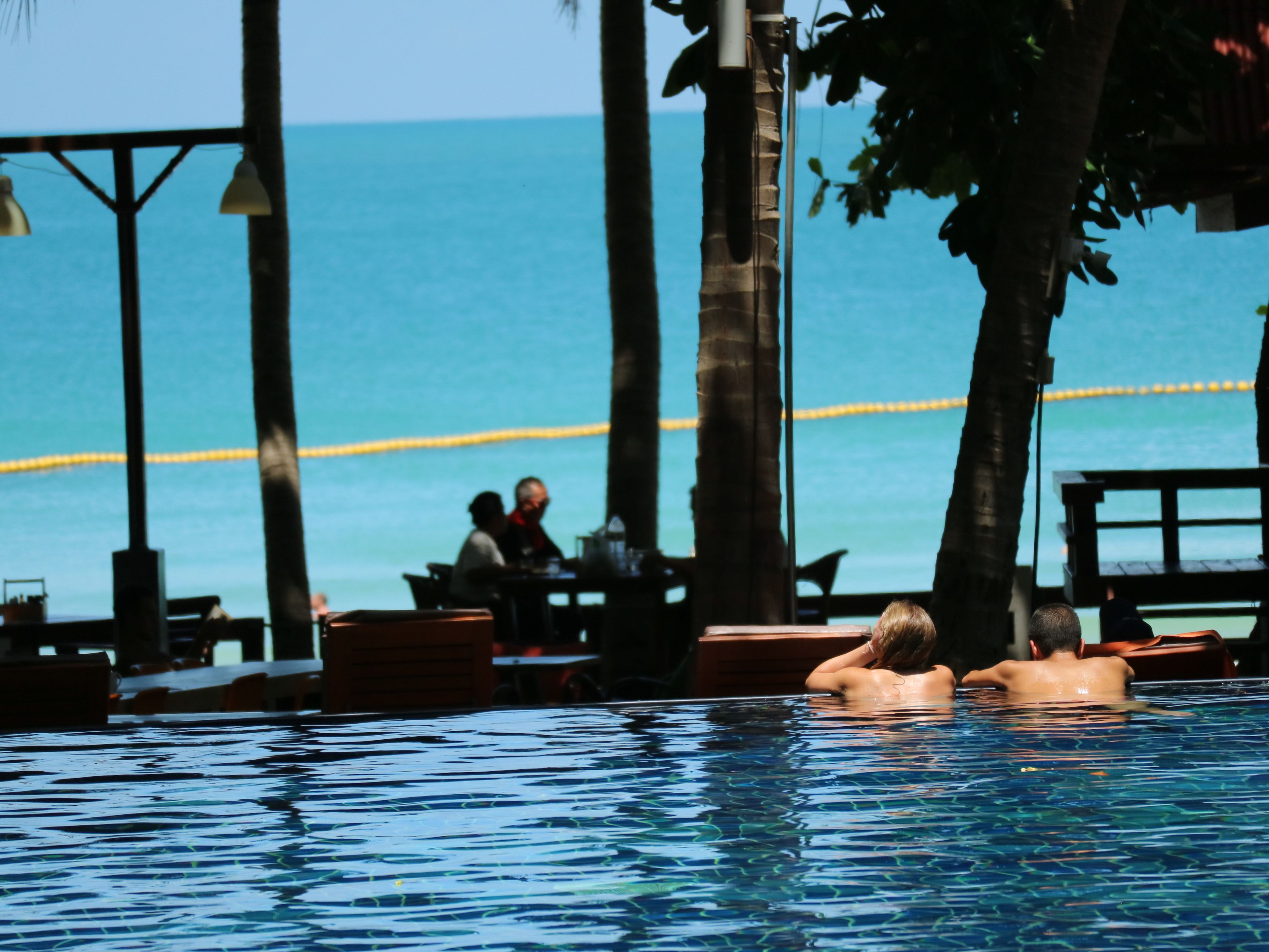 outdoor pool, pool umbrellas, pool loungers