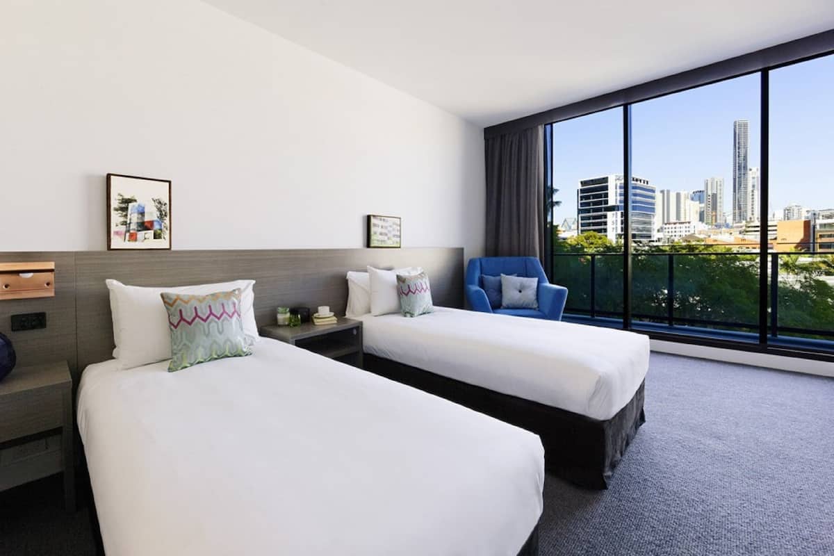 Deluxe Studio, Balcony | In-room safe, blackout drapes, soundproofing, iron/ironing board