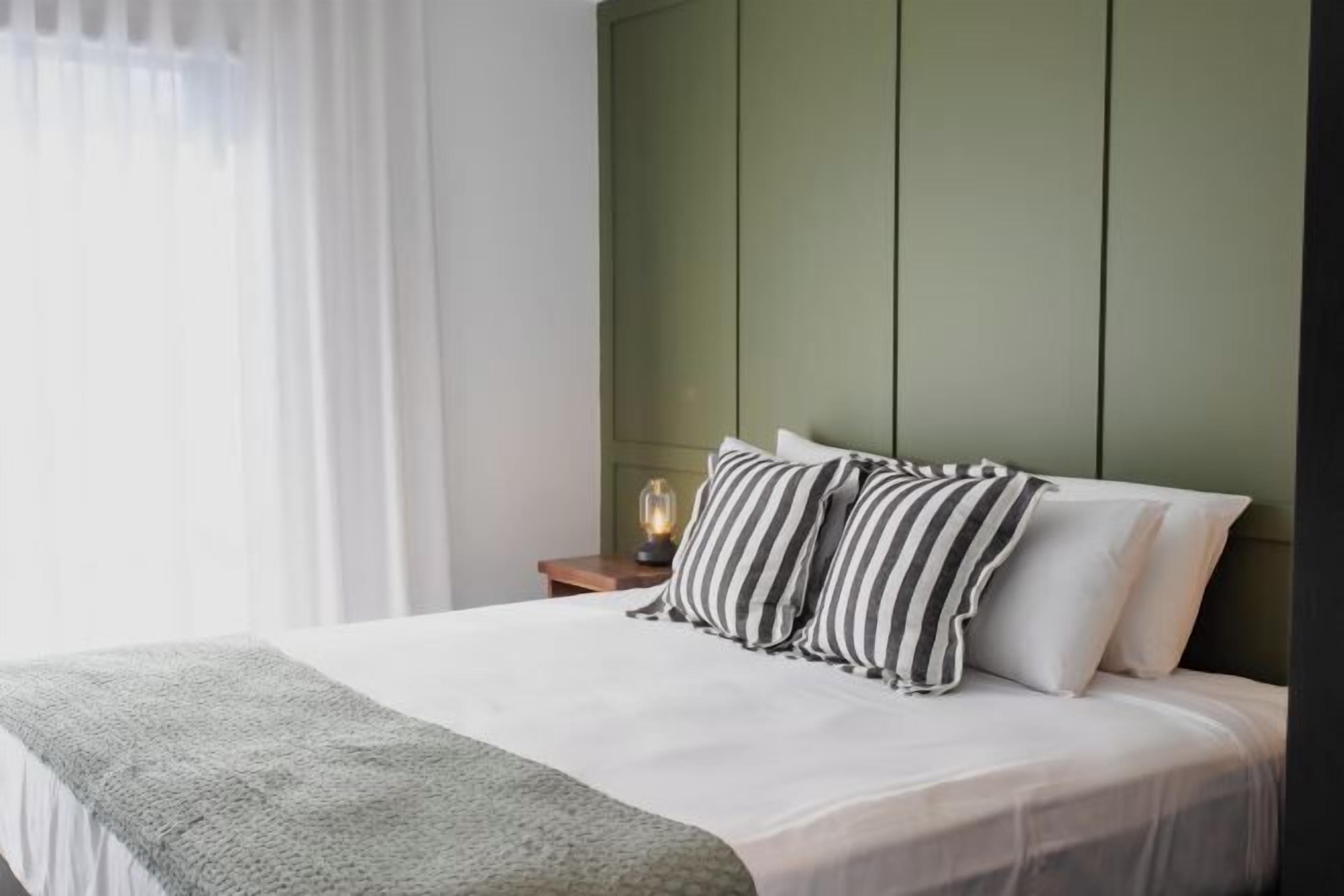 Minibar, individually decorated, blackout curtains, iron/ironing board