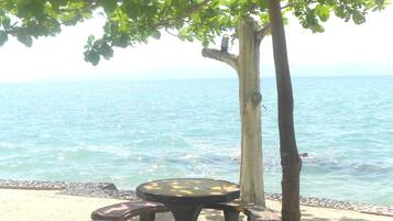On the beach, sun-loungers, beach towels