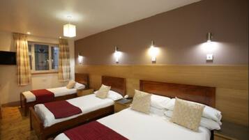 Quadruple Room | Desk, iron/ironing board, free WiFi, bed sheets