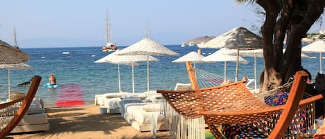 Private beach, sun loungers, beach umbrellas, beach bar