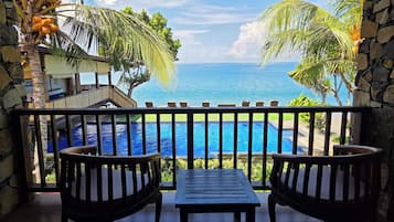 Chambre Deluxe, vue mer, en bord de plage | Terrasse/Patio