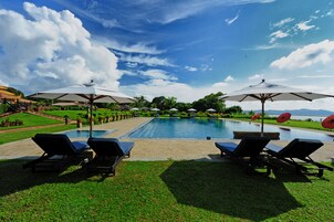 Outdoor pool, pool umbrellas, sun loungers