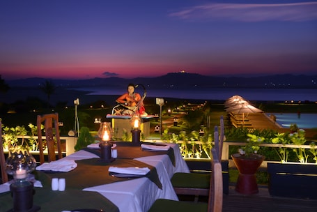 Breakfast, lunch, dinner served; international cuisine, garden views