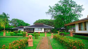 Deluxe Room, River View | Minibar, in-room safe, individually decorated, individually furnished