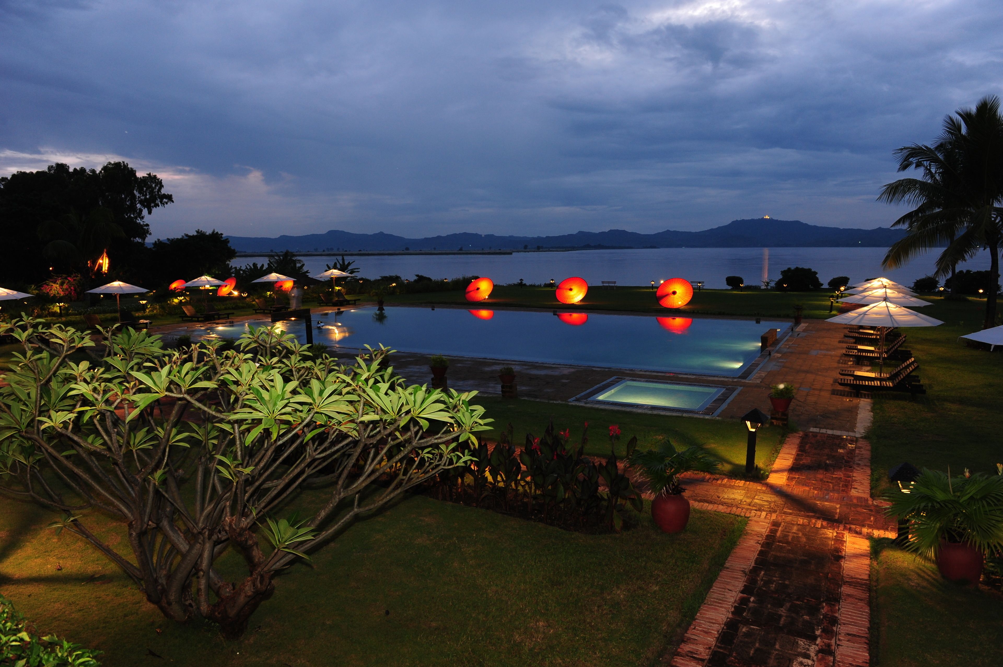 outdoor pool, pool umbrellas, pool loungers