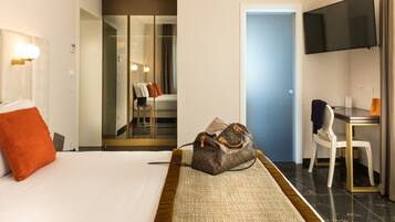 Superior Room | Minibar, in-room safe, desk, laptop workspace