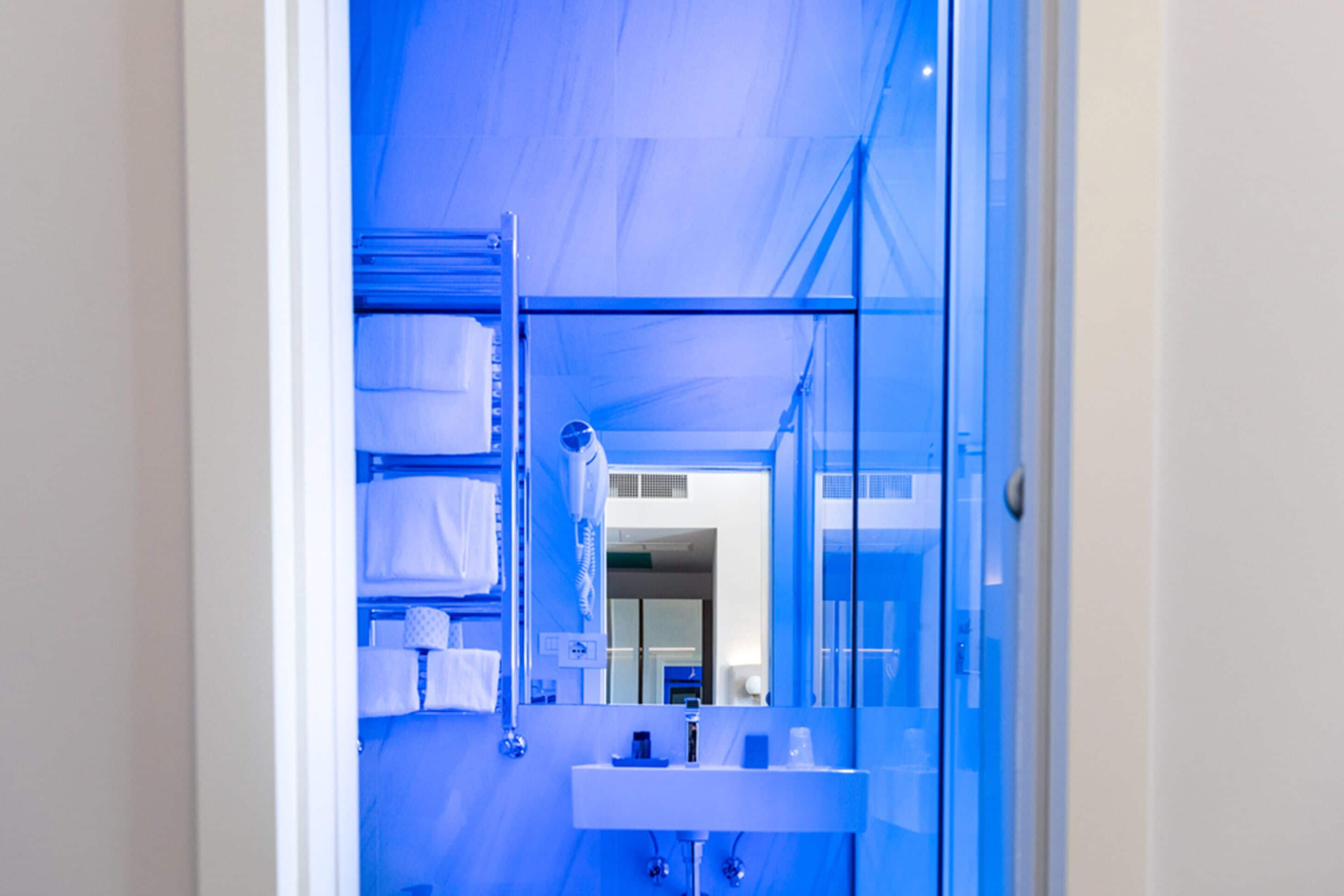 deluxe room | bathroom | shower, free toiletries, hair dryer, slippers