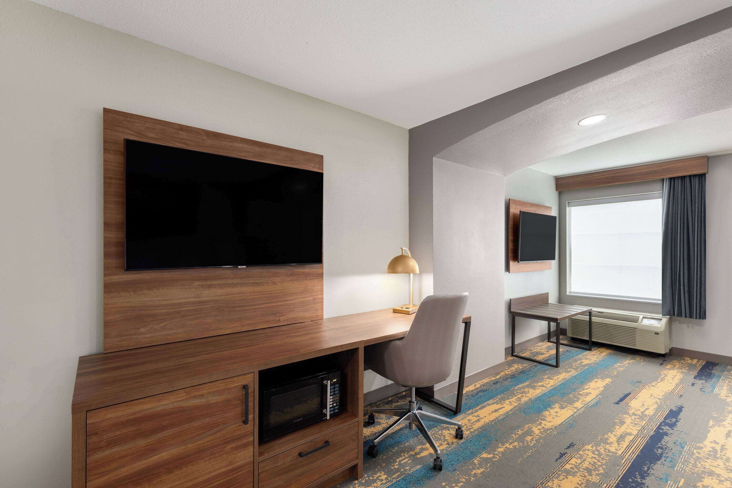 premium bedding, pillow-top beds, desk, laptop workspace