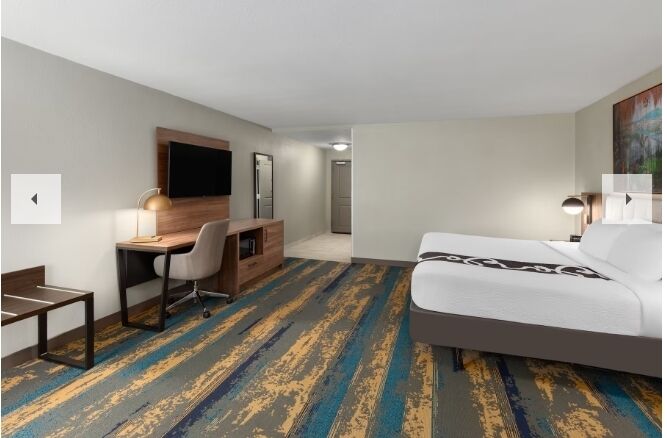 Premium bedding, pillowtop beds, desk, laptop workspace