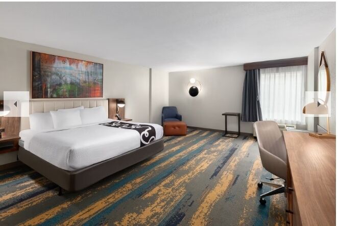 Premium bedding, pillowtop beds, desk, laptop workspace
