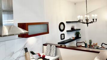 Apartment | Private kitchen | Fridge, stovetop, cookware/dishes/utensils, freezer