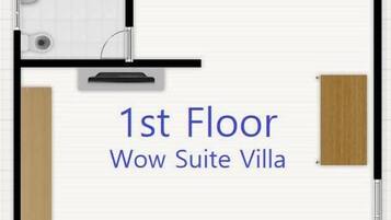 Planta baixa da Wow Suite Villa no primeiro andar, com cozinha, banheiro, sala de estar e espaço de jantar.