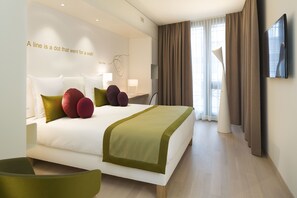 Deluxe Room (Patio) | Premium bedding, in-room safe, desk, blackout drapes