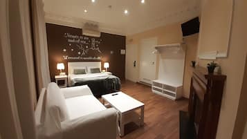 Junior Studio Suite, Jetted Tub | Blackout drapes, iron/ironing board, free WiFi, bed sheets