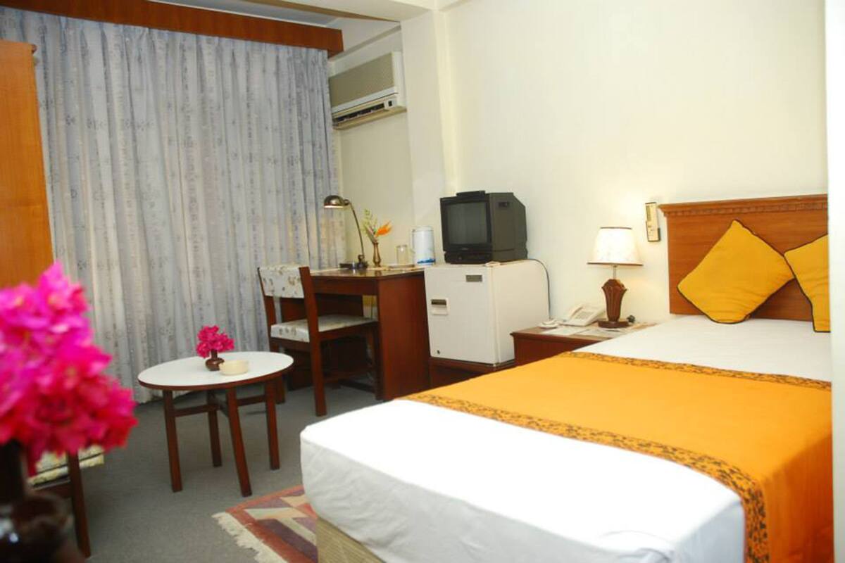 Minibar, desk, blackout drapes, iron/ironing board