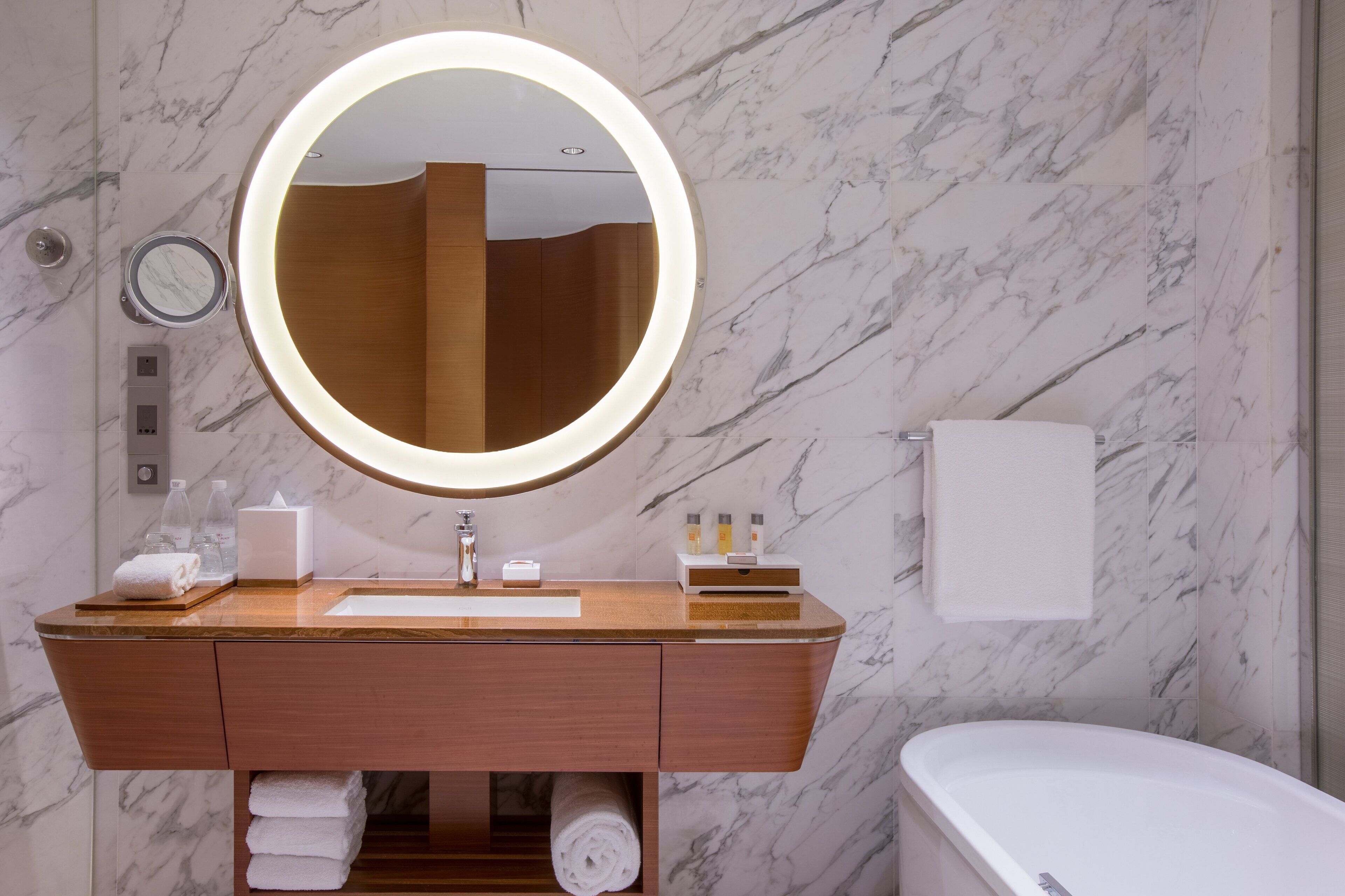 separate bathtub and shower, rainfall showerhead, designer toiletries