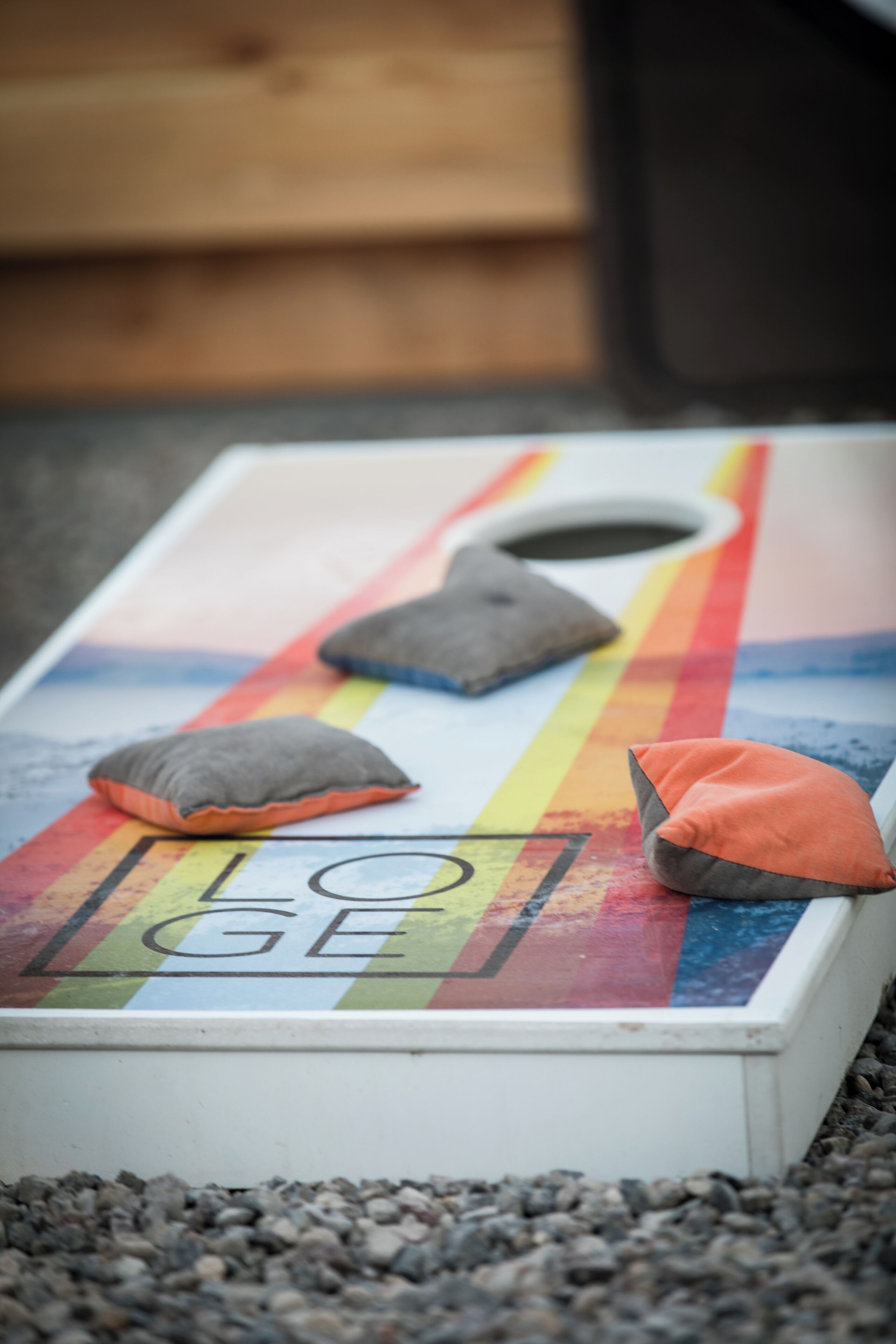 A colorful board game with pillows placed on it.