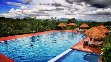 Outdoor pool, pool umbrellas, sun loungers