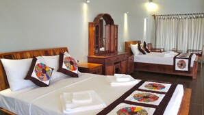 A hotel room with two beds, wooden headboards, a wooden dresser, a mirror, and a window with curtains. - Memoria Palace & Resort (Pailin)