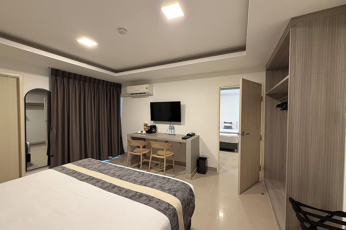 Family Suite | Frigobar, escrivaninha, espaço de trabalho para notebook