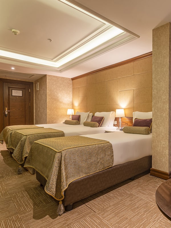 Standard Triple Room | 1 bedroom, premium bedding, minibar, in-room safe
