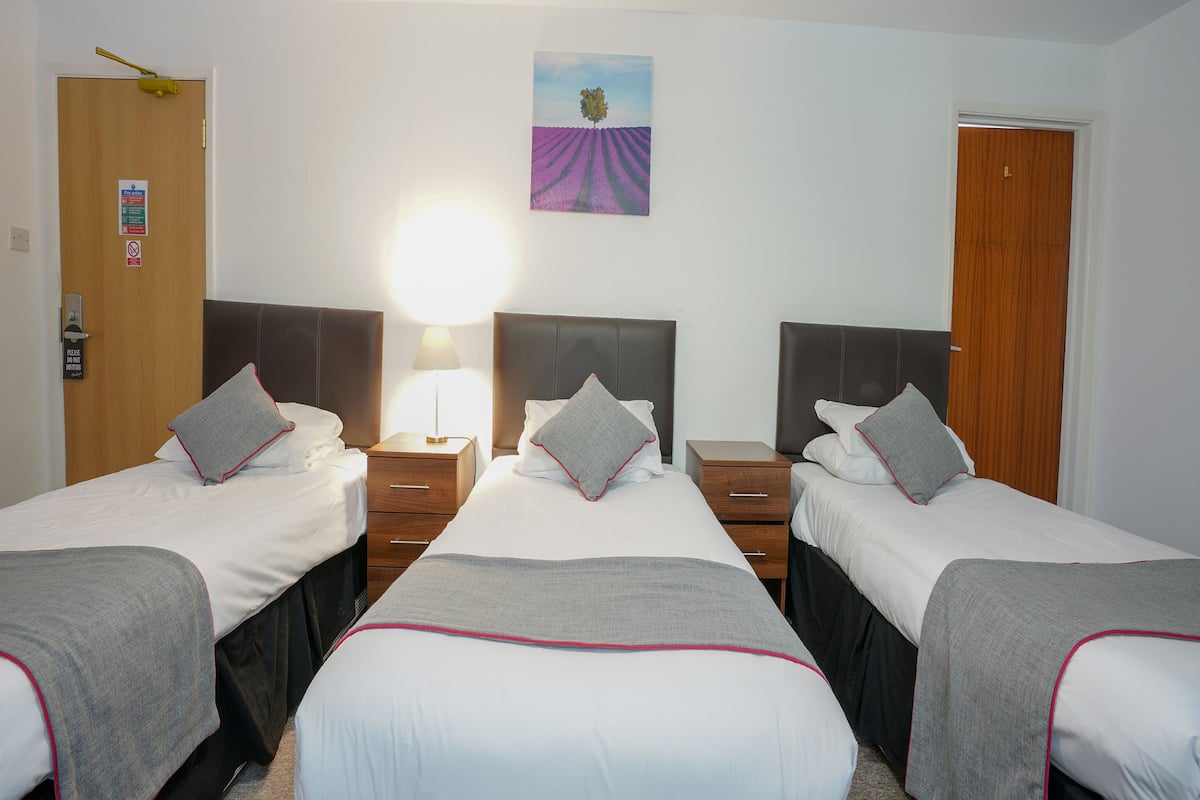 Standard Triple Room, 3 Single Beds | 1 bedroom, bed sheets