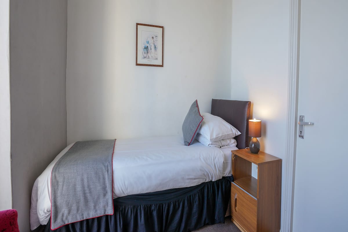 Standard Single Room, Balcony, Sea View | 1 bedroom, bed sheets