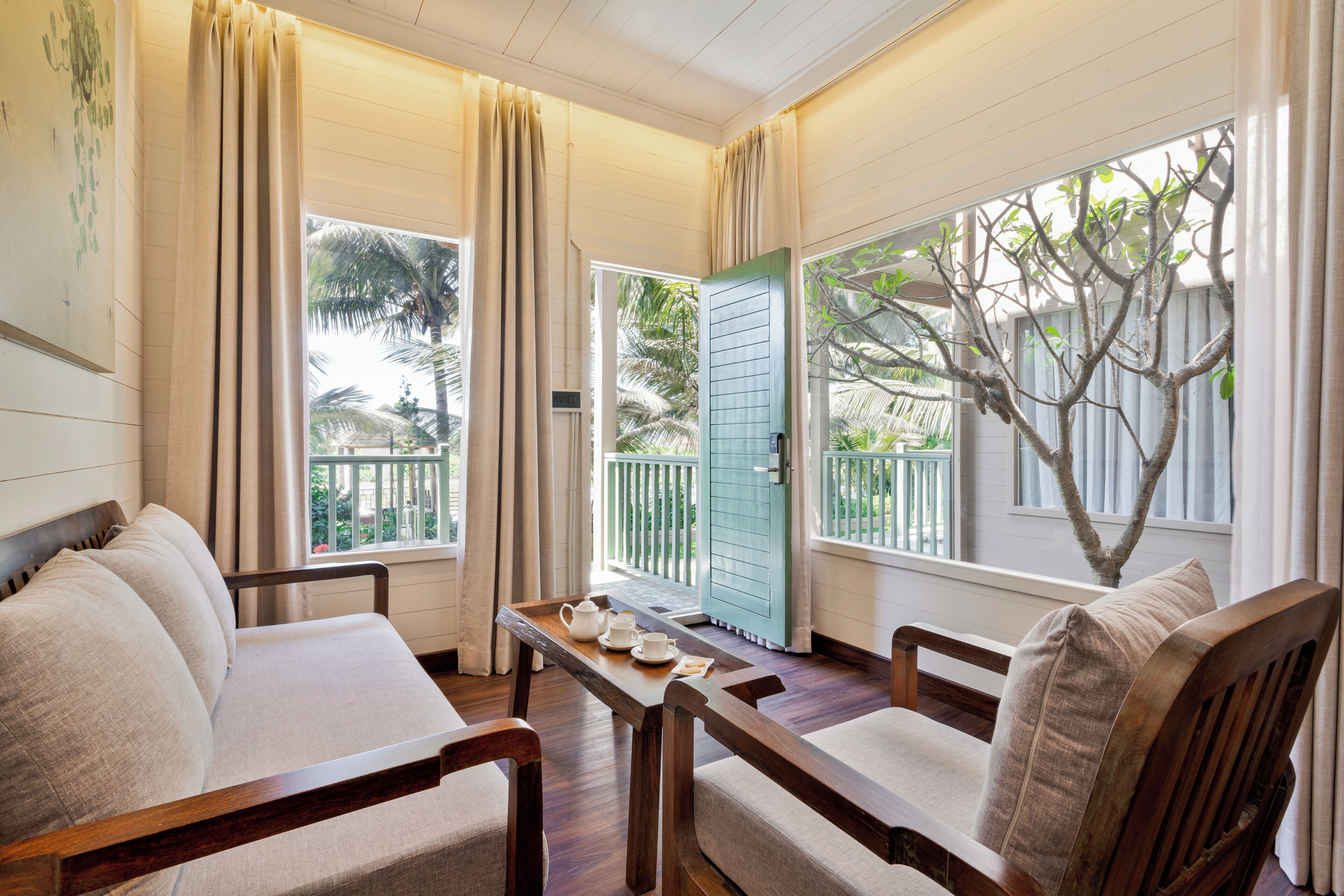 Premium River View Cottage with Balcony | Minibar, coffres-forts dans les chambres, Wi-Fi gratuit, draps fournis