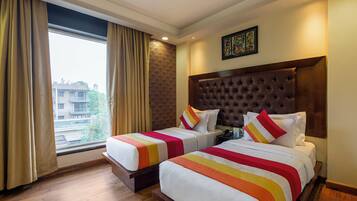 Deluxe Double or Twin Room, City View | In-room safe, desk, iron/ironing board, rollaway beds