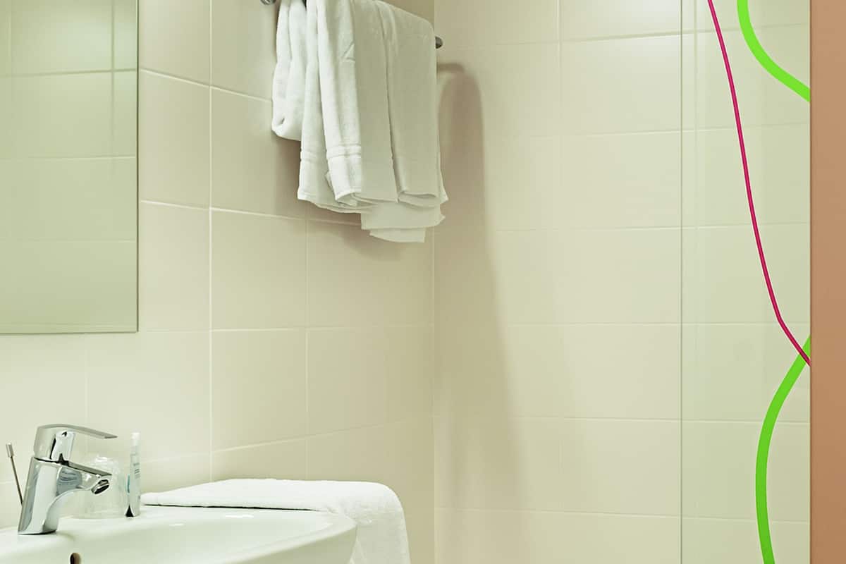 shower, eco-friendly toiletries, hair dryer, towels