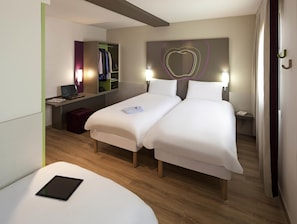 Standard Room, Multiple Beds | In-room safe, desk, soundproofing, iron/ironing board