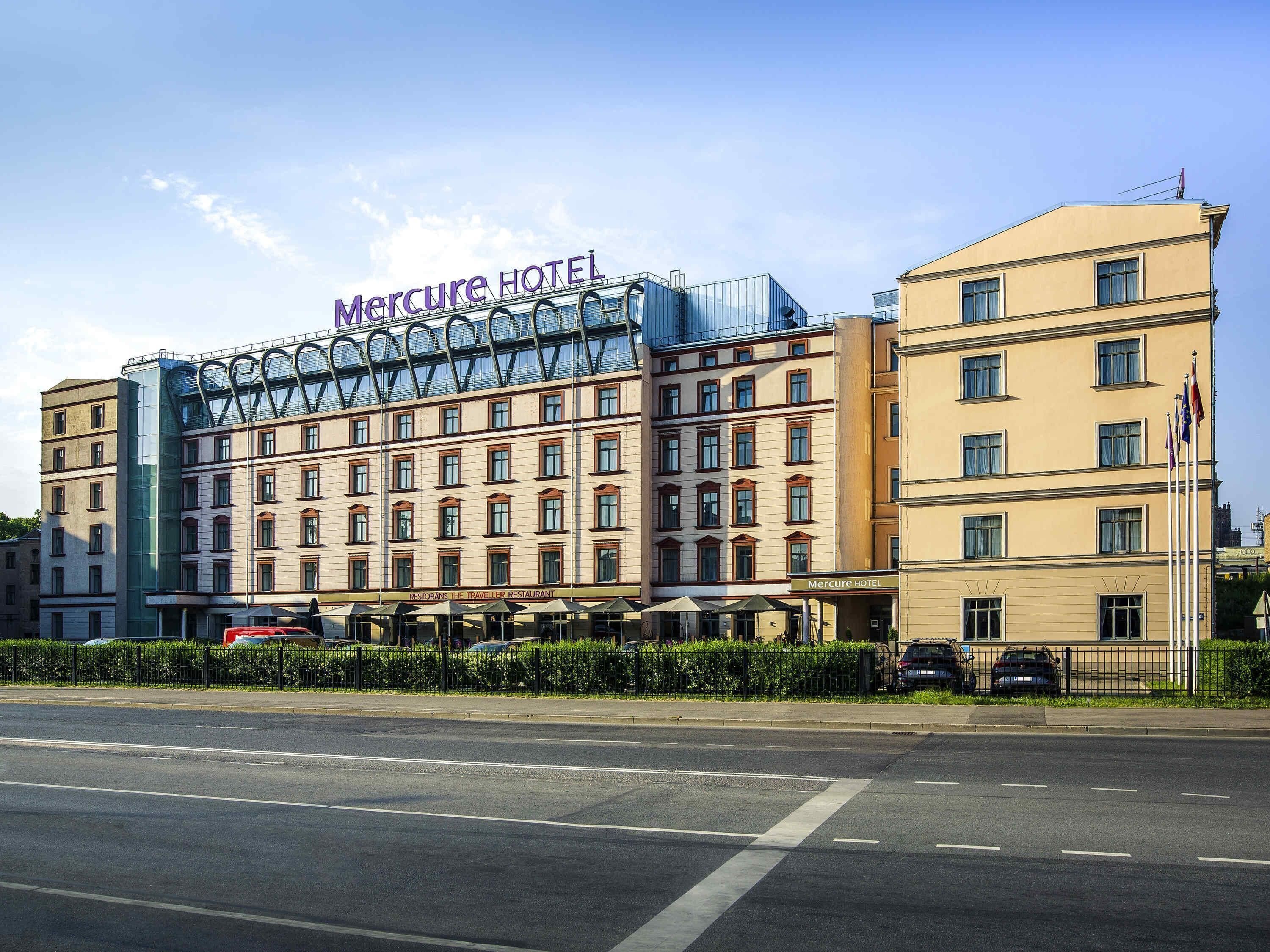 A hotel building with a prominent sign reading 'Mercure HOTEL'.