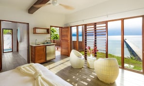 Oceanfront Retreat | Premium bedding, minibar, in-room safe, blackout drapes
