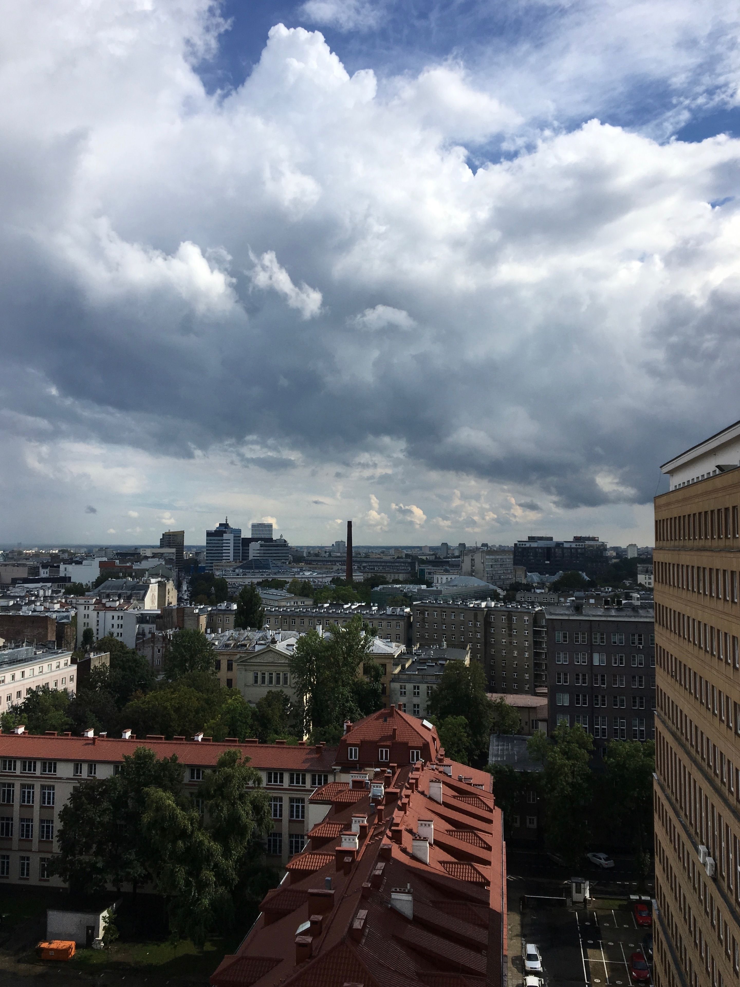 A cityscape with a view of buildings and a river.