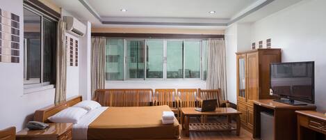 Suíte | Frigobar, escrivaninha, cortinas blackout, quartos à prova de som