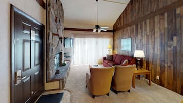 2 Bedroom / 2 Bathroom Condominium | Living area | Flat-screen TV, fireplace, DVD player