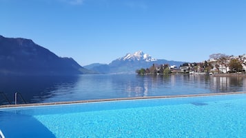 Seasonal outdoor pool, pool umbrellas, sun loungers