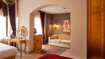 Deluxe Quadruple Room | 1 bedroom, premium bedding, minibar, in-room safe