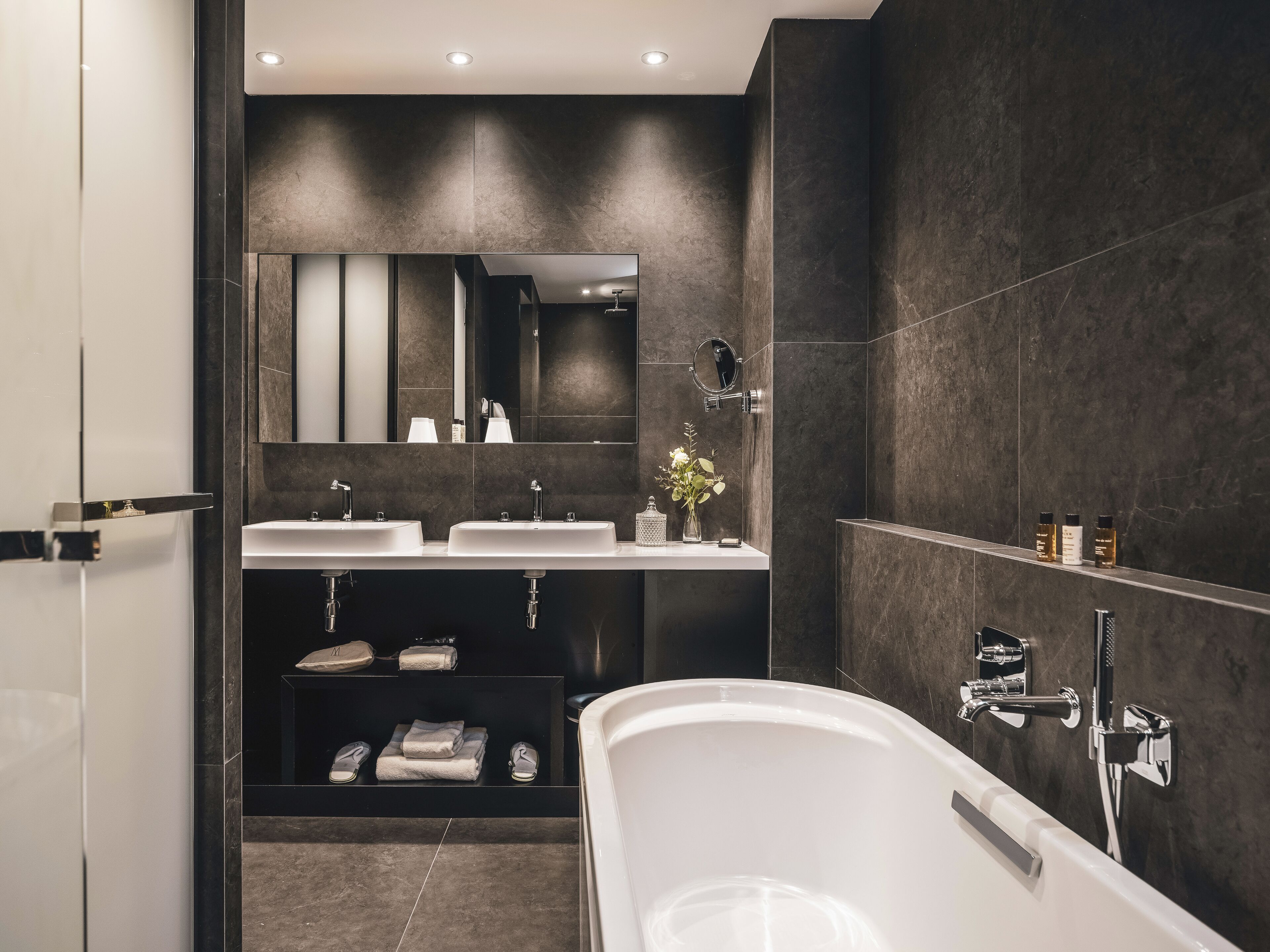 deluxe room with double bed or twin beds | bathroom | eco-friendly toiletries, hair dryer, bathrobes, slippers