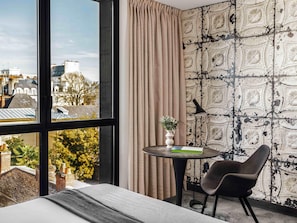 Premium bedding, free minibar, in-room safe, desk
